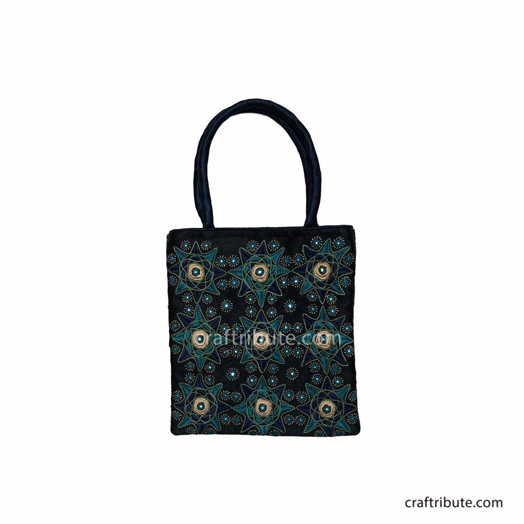 Black hand bag showcasing Pakko Kutch Embroidery with 9 Stars design in attractive Green & silver combination