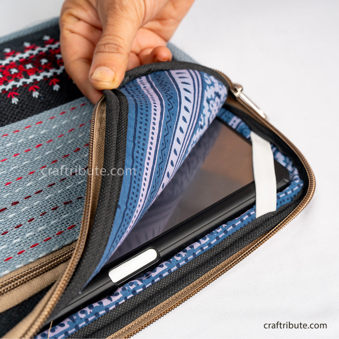 Inside view of hand embroidered jute 11" iPad/Tablet sleeve in Black & Grey showcasing the soft cushioning & elastic corners for complete safety of your iPad/Tablet
