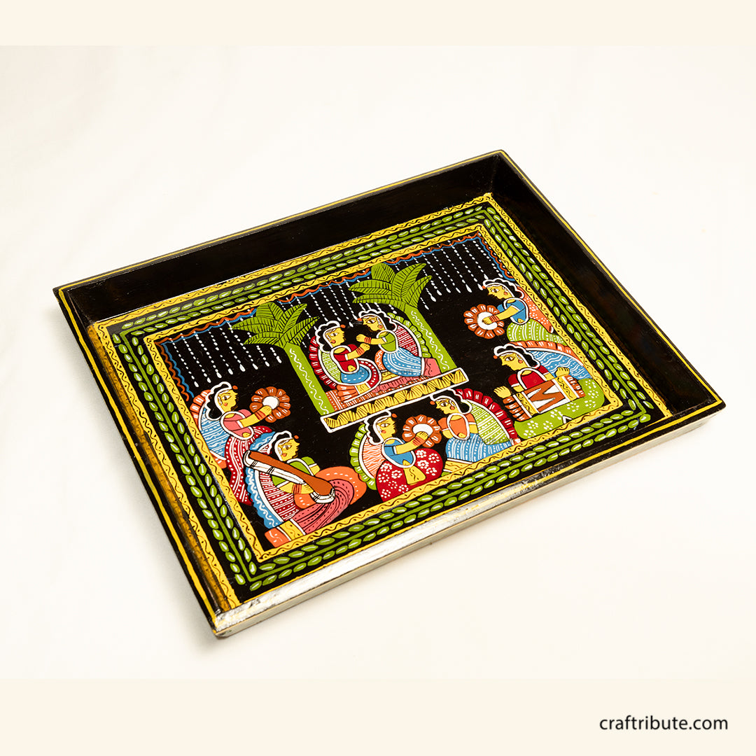 Decorative hand-painted Tikuli Art tray depicting intricate courtyard scene on a white background