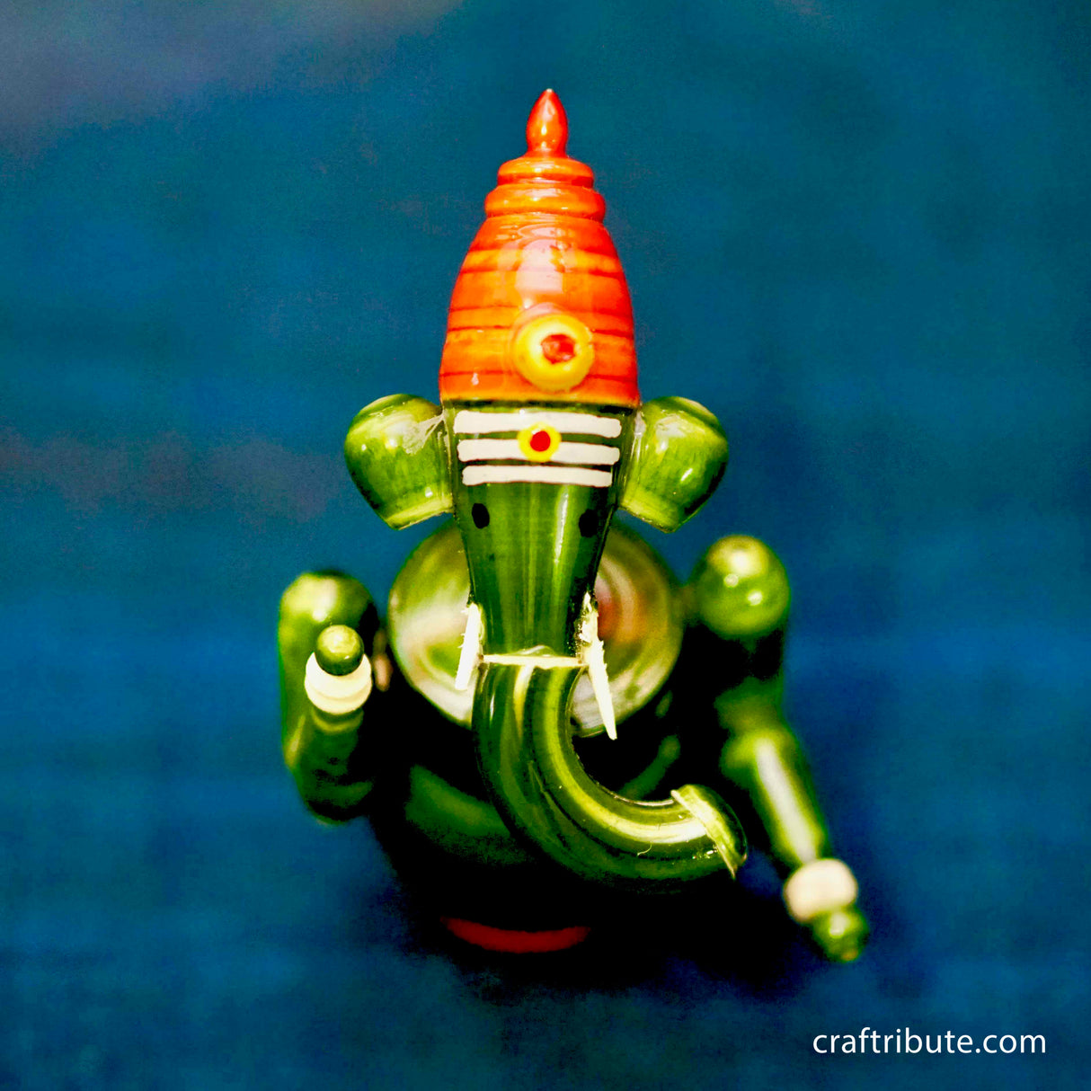 Handcrafted laquer finished Wooden Ganesha idol in organic Green colour from Etikoppaka