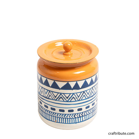 Front view of hand painted Naqashi steel jar in white and blue geometric design
