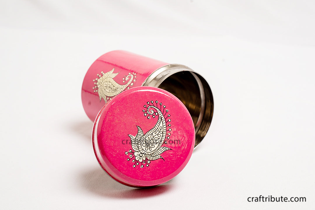 Artistic view of hand painted steel container with paisley design