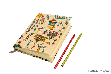 Handmade Paper Notebook with tribal design and ruled pages and an elastic band