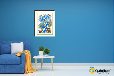 Blue Home wall with framed Gond Painting portraying a tree with blue leaves