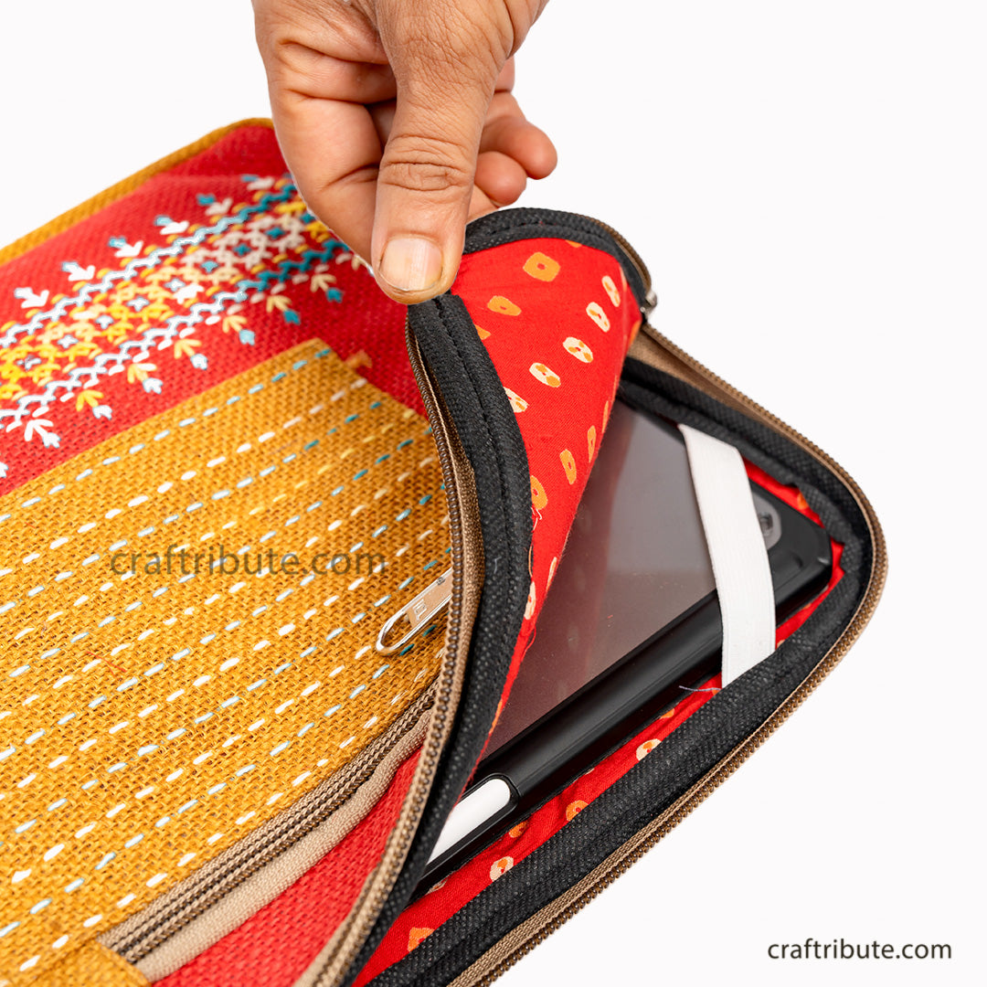 Inside view of Bright & Beautiful Hand Embroidered Jute 11"iPad/Tablet sleeve in Red & Yellow showcasing the soft padding & elastic corners for the extra protection of your iPad/Tablet