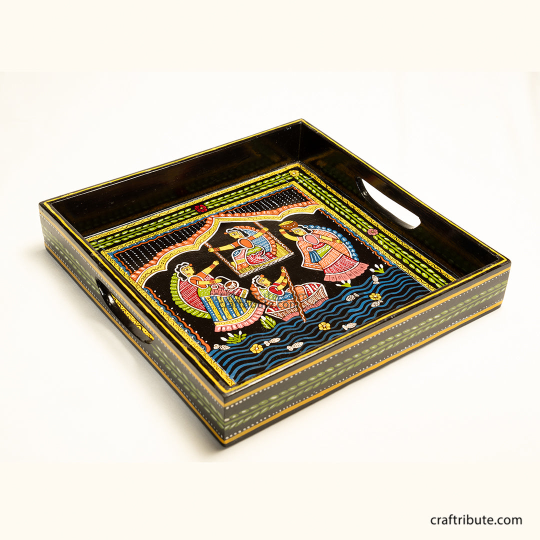 Hand-painted Tikuli Art Decorative tray with intricate design depicting boating and other fun activities by friends on a riverbed.