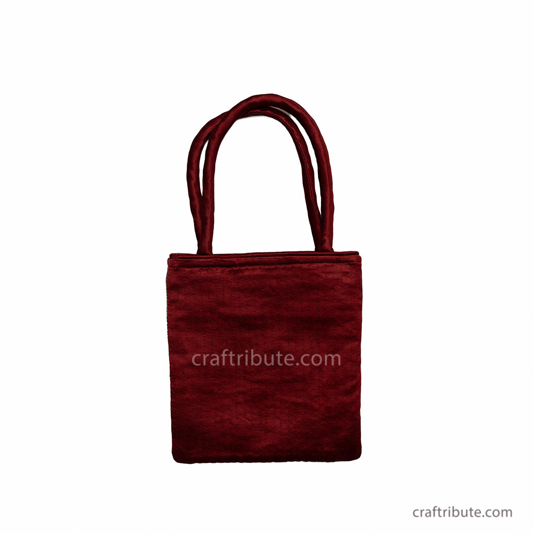 Back side of a hand bag in Pakko Kucth Embroidery