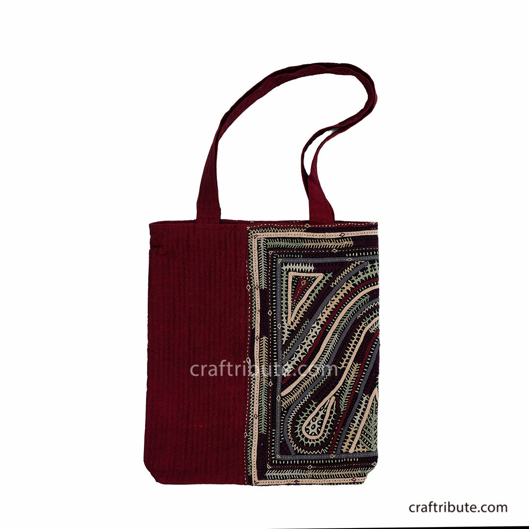 Red tote bag with Khudi Seba Kutch Embroidery with grey & white design