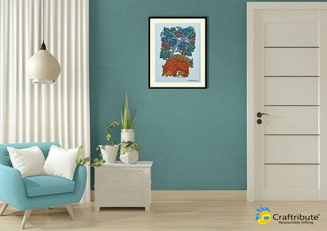 Gond Painting framed on a wall depicting bears under a tree