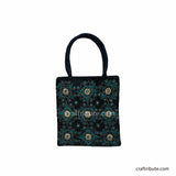 Black hand bag showcasing Pakko Kutch Embroidery with 9 Stars design in attractive Green & silver combination 
