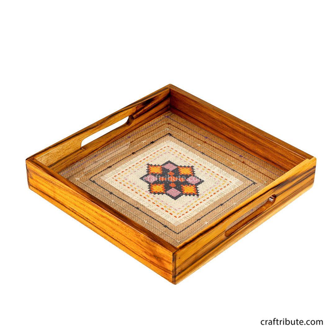 Square shaped Sagwan Wooden Tray with hand embroidered jute base.