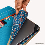 Inside view of hand embroidered jute  15" laptop sleeve showcasing the soft padding and elastic corners for extra protection of your laptoplaptop 