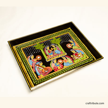 Decorative hand-painted Tikuli Art tray depicting intricate courtyard scene on a white background