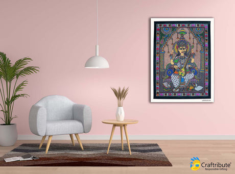 Folk art Madhubani painting of Devi Saraswati hung on a living room wall