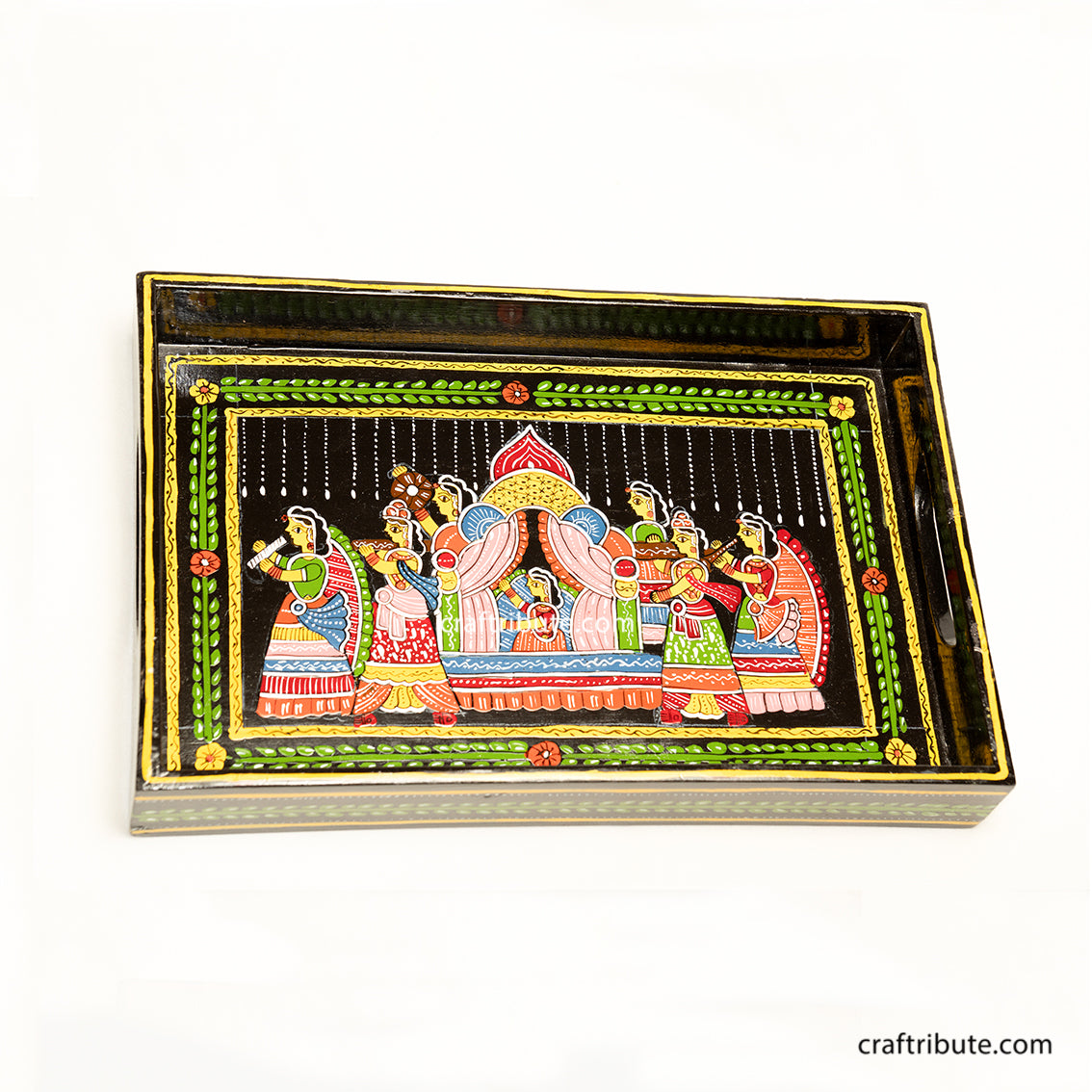Decorative tray with a colorful design of a bride being carried in a paliquin. Traditional design and beautiful finish make it a collectible.