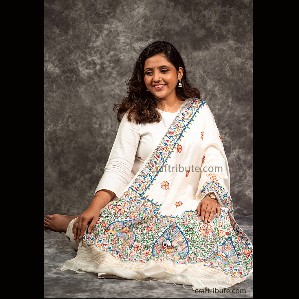 Gadwal silk dupatta with beautiful dancing peacocks and floral design in vibrant colours  hand painted by traditional artisans from Madhubani, Bihar. 