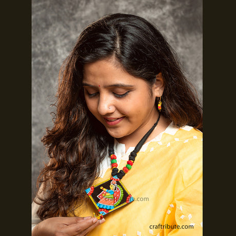 Handcrafted unique jewellery set made with hand painted colourful Tikuli Art Pendant and a pair of Wooden Earrings in Bird Shape