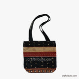Front side of a Kutch Khudi Sebha, Hand Embroidered Tote Bag with Stripes in black & beige colour combination