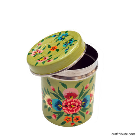 Artistic view of a hand painted steel container with delicate floral design