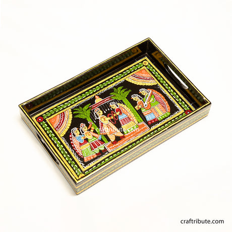 Wooden tray depicting an indian wedding in its full grandeur. Hand-painted in vibrant colours by Tikuli Artists from Patna, Bihar