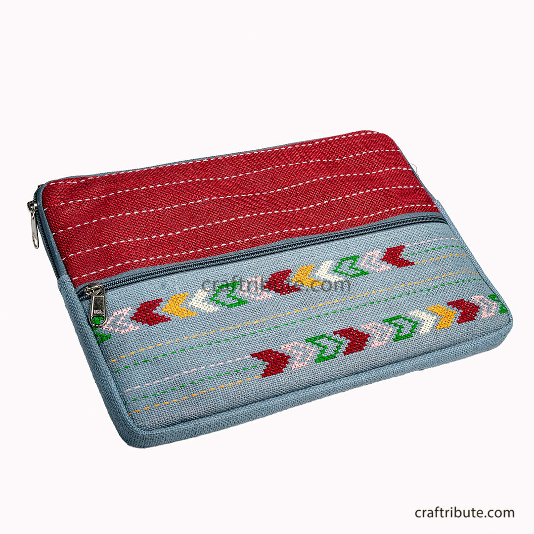 Eye Catchy eco firendly Jute 15" lap top sleeve hand embroidered by tribal sisters from Rajasthan.