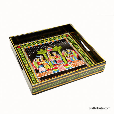 Hand-painted decorative Tikuli tray with intricate wedding design in vibrant colours on a black background