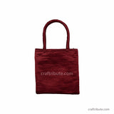 Backside of Neran Kutch Embroidery handbag with red & gold scorpio design