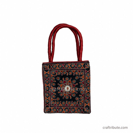 Party bag in Pakko Kucth Embroidery with shining star design in classic Red & Black colours