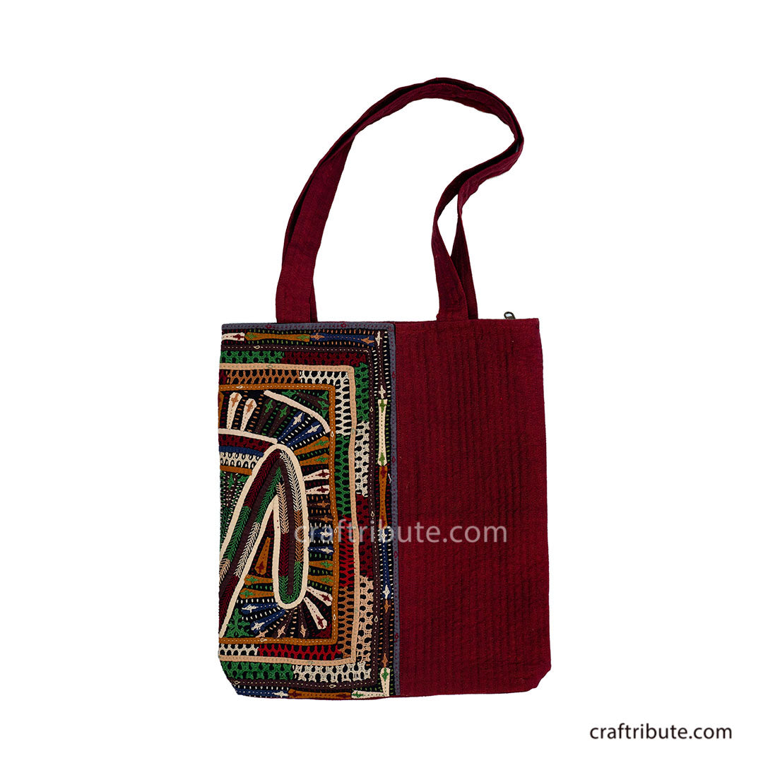 Red tote bag with Khudi Seba Kutch Embroidery with colourful design - Front