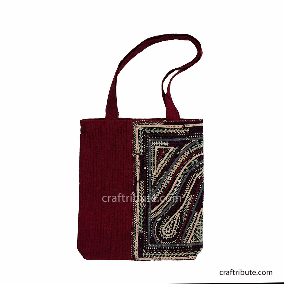 Red tote bag with Khudi Seba Kutch Embroidery with grey & white design 
